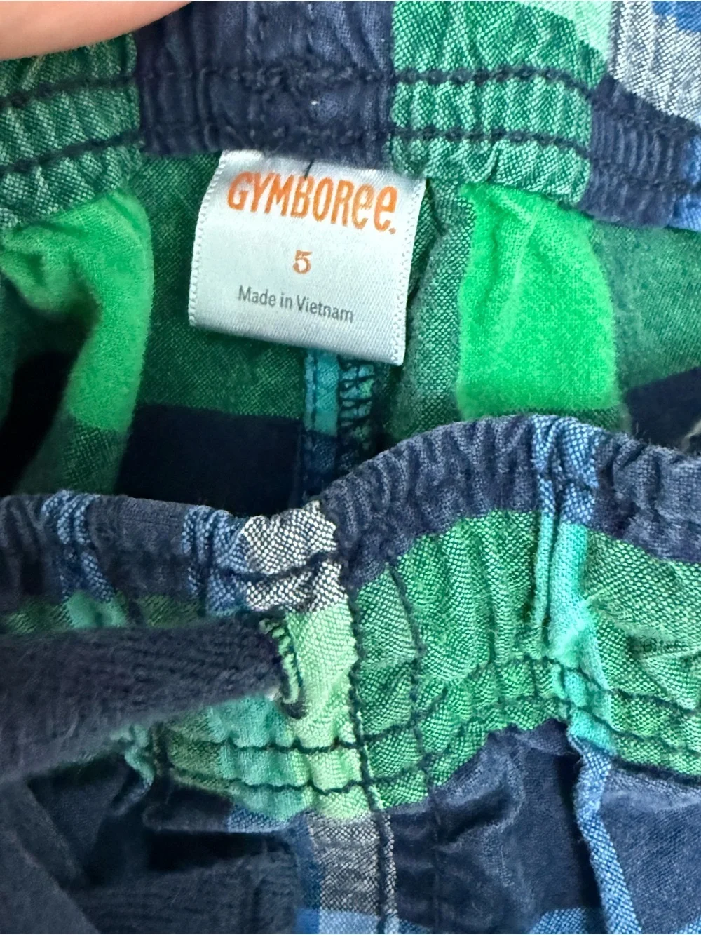 Gymboree boys green and navy blue plaid cargo shorts with an elastic waistband.